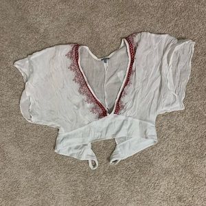 Sheer white crop top deep V